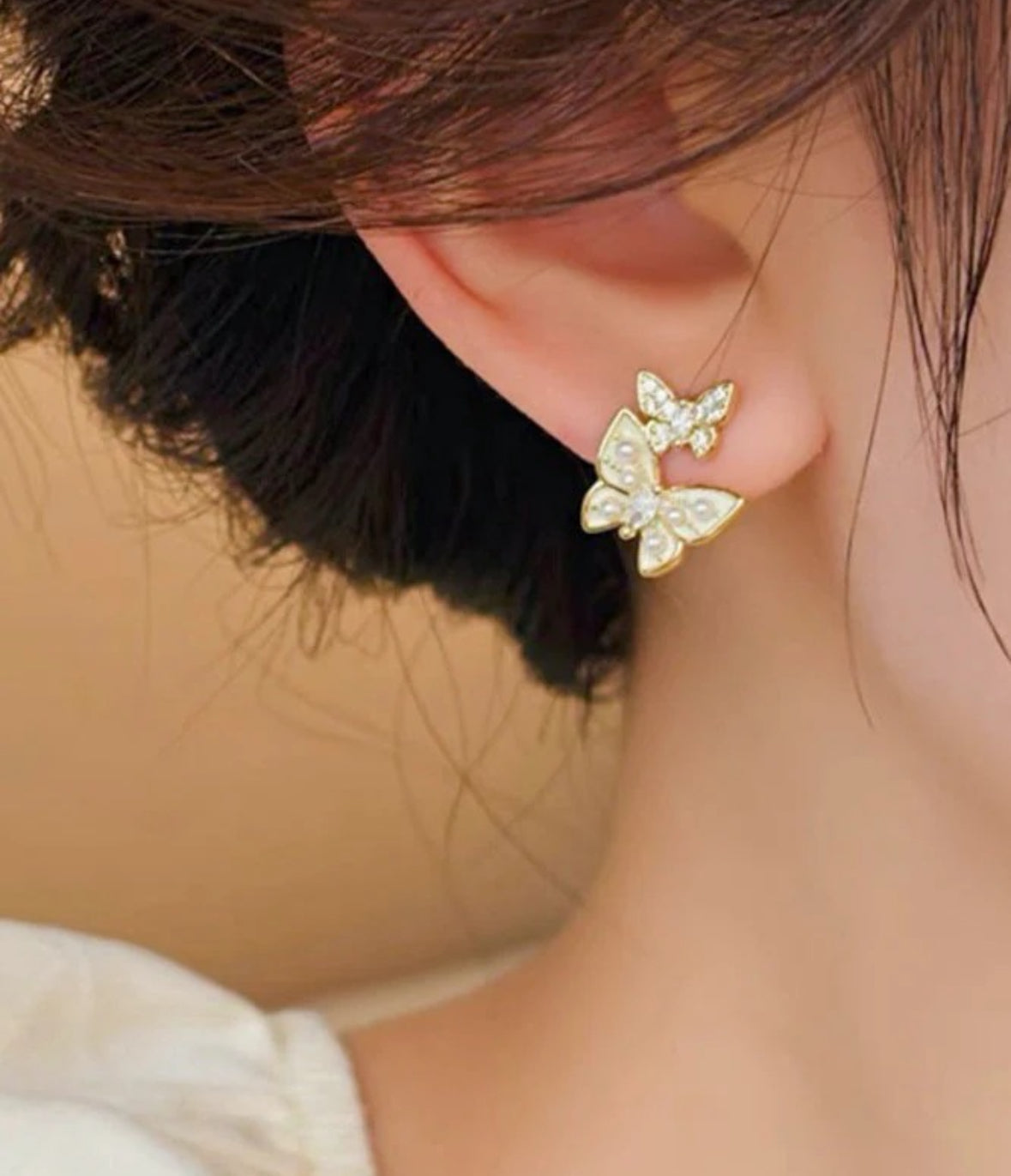 Dual Butterfly Drip
Glaze Pearl Stud Earrings